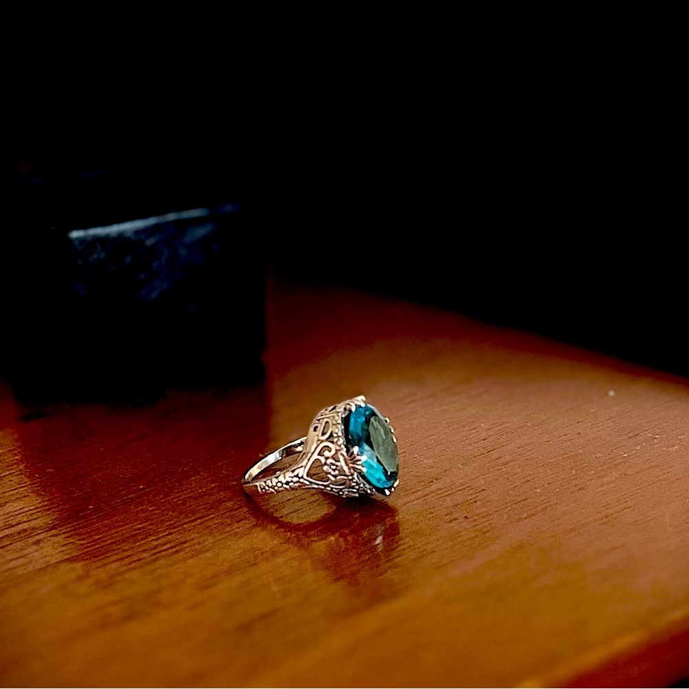 Vintage blue topaz sterling silver ring with heart and crown details